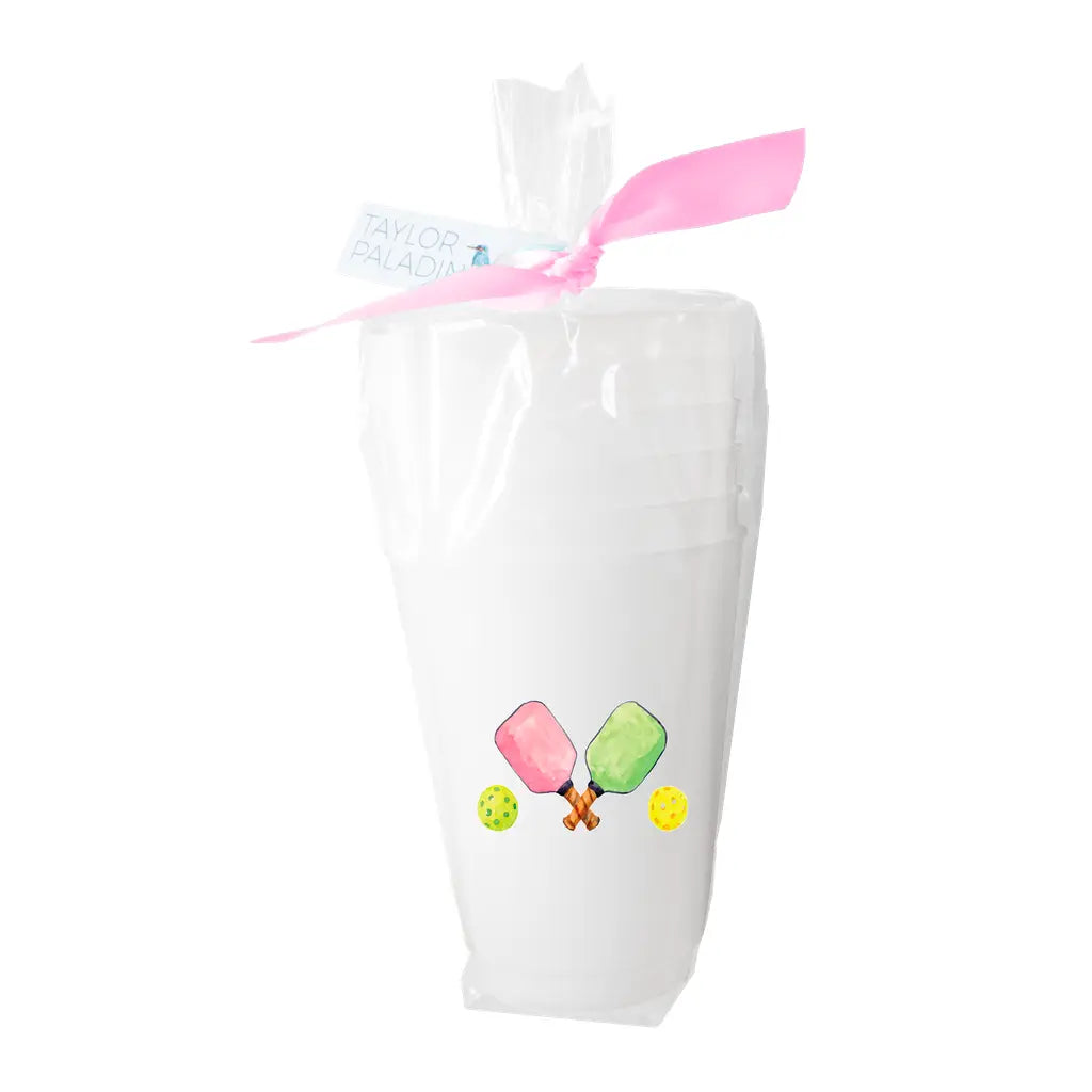 White bag with colorful graphics and a pink ribbon on a white background