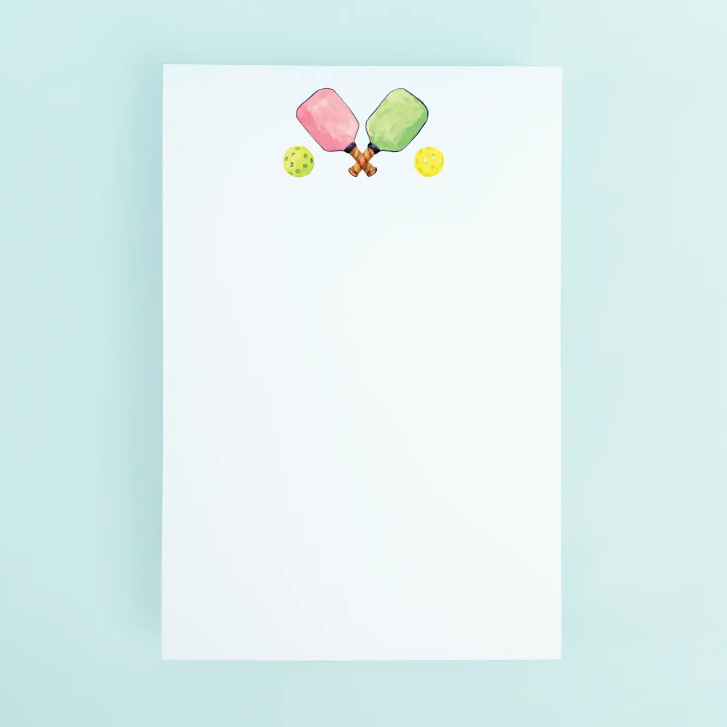 Notepad with ice cream and tennis racket design on a light blue background