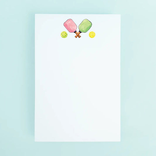 Notepad with ice cream and tennis racket design on a light blue background