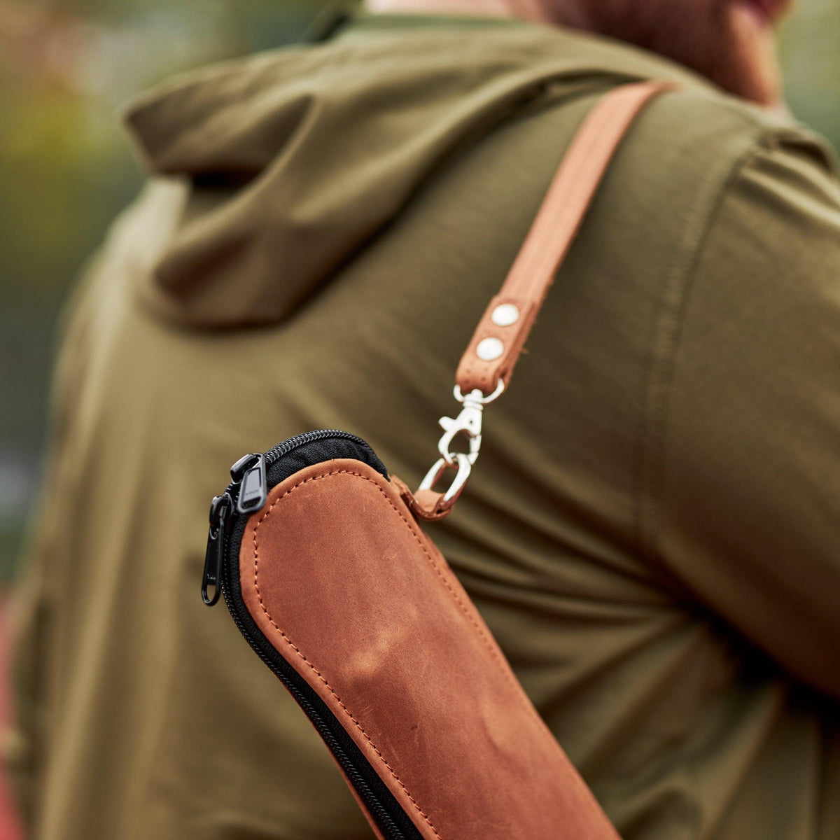 Close up of leather tennis racquet bag
