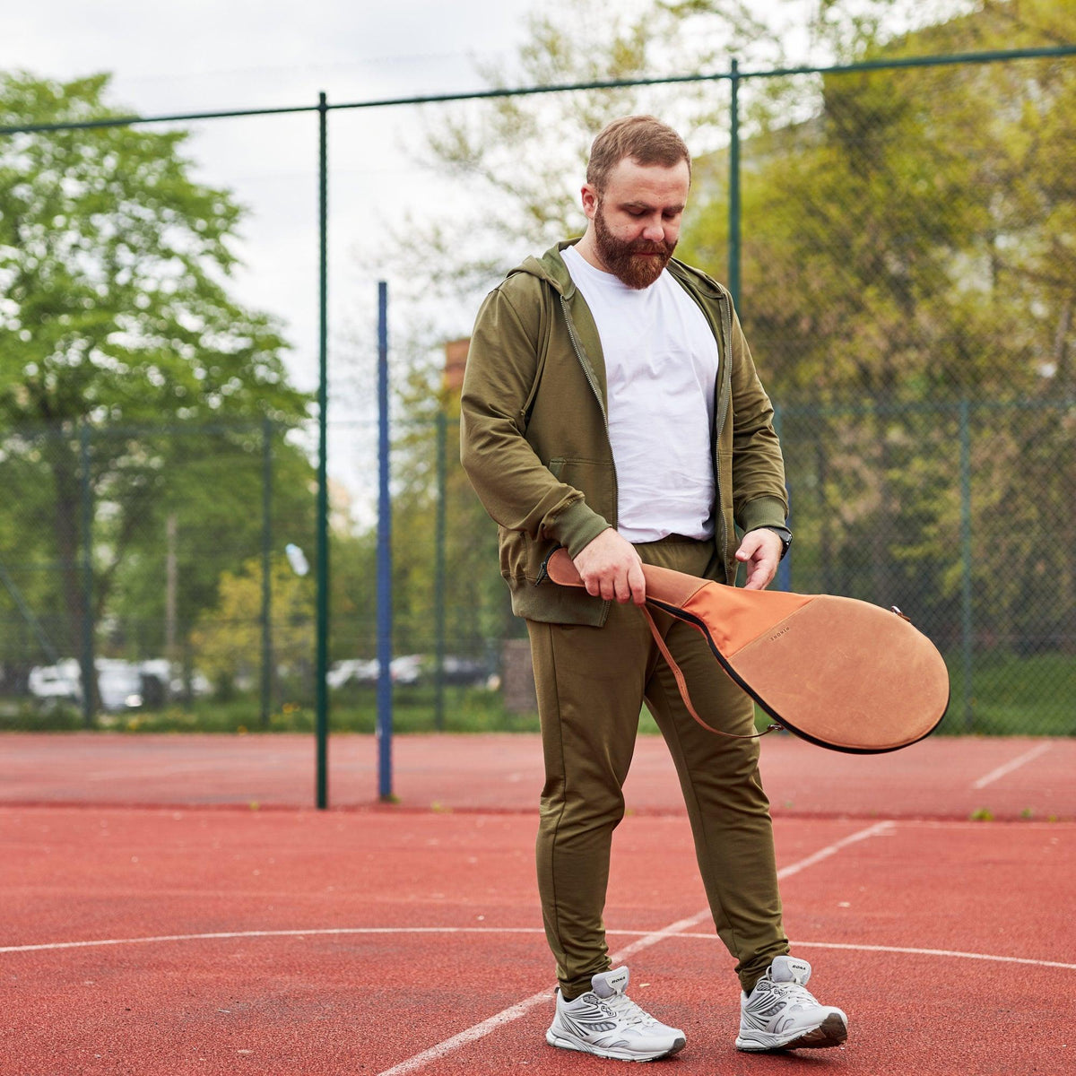 Genuine leather tennis racquet