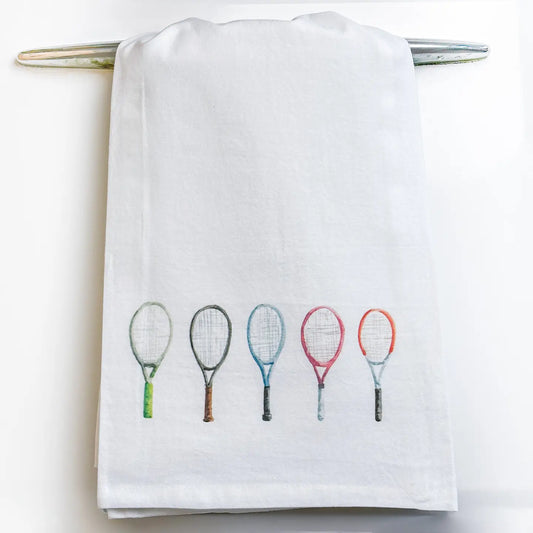 White towel with colorful tennis racket designs on a white background