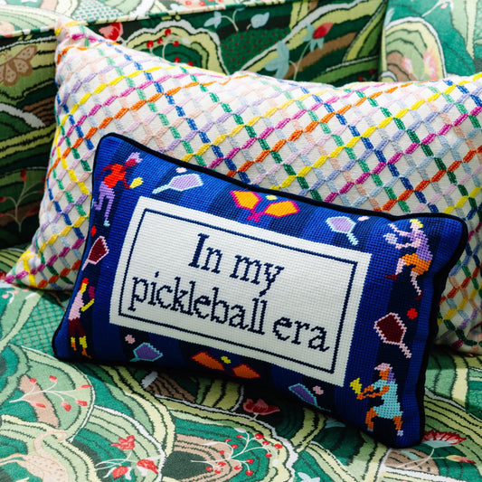 Decorative pillow with 'In my pickleball era' text on a colorful background
