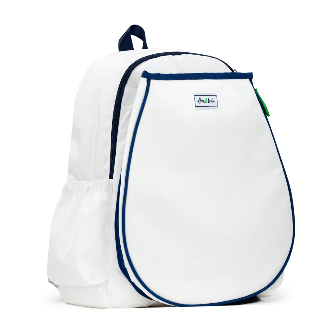 White Ame & lulu tennis backpack with navy accents on a white background