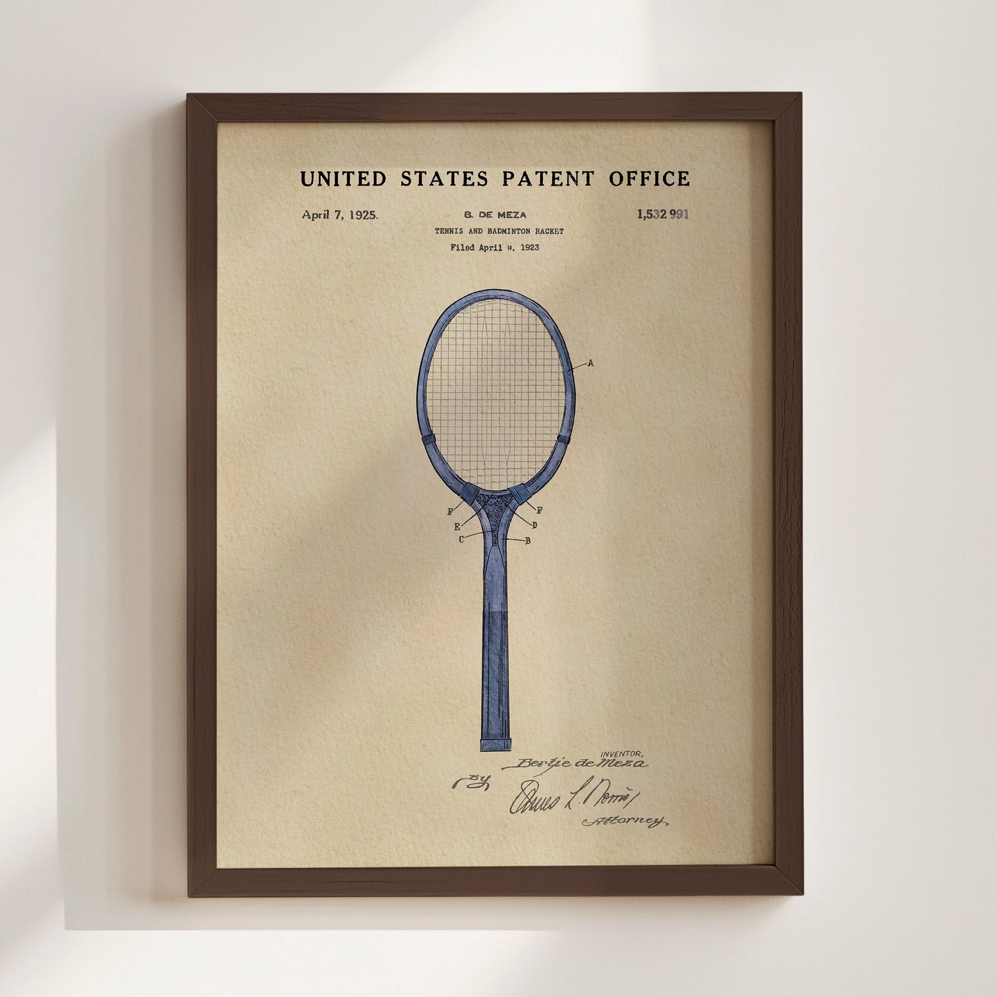 Framed United States Patent Office poster of a tennis racket design on a beige background