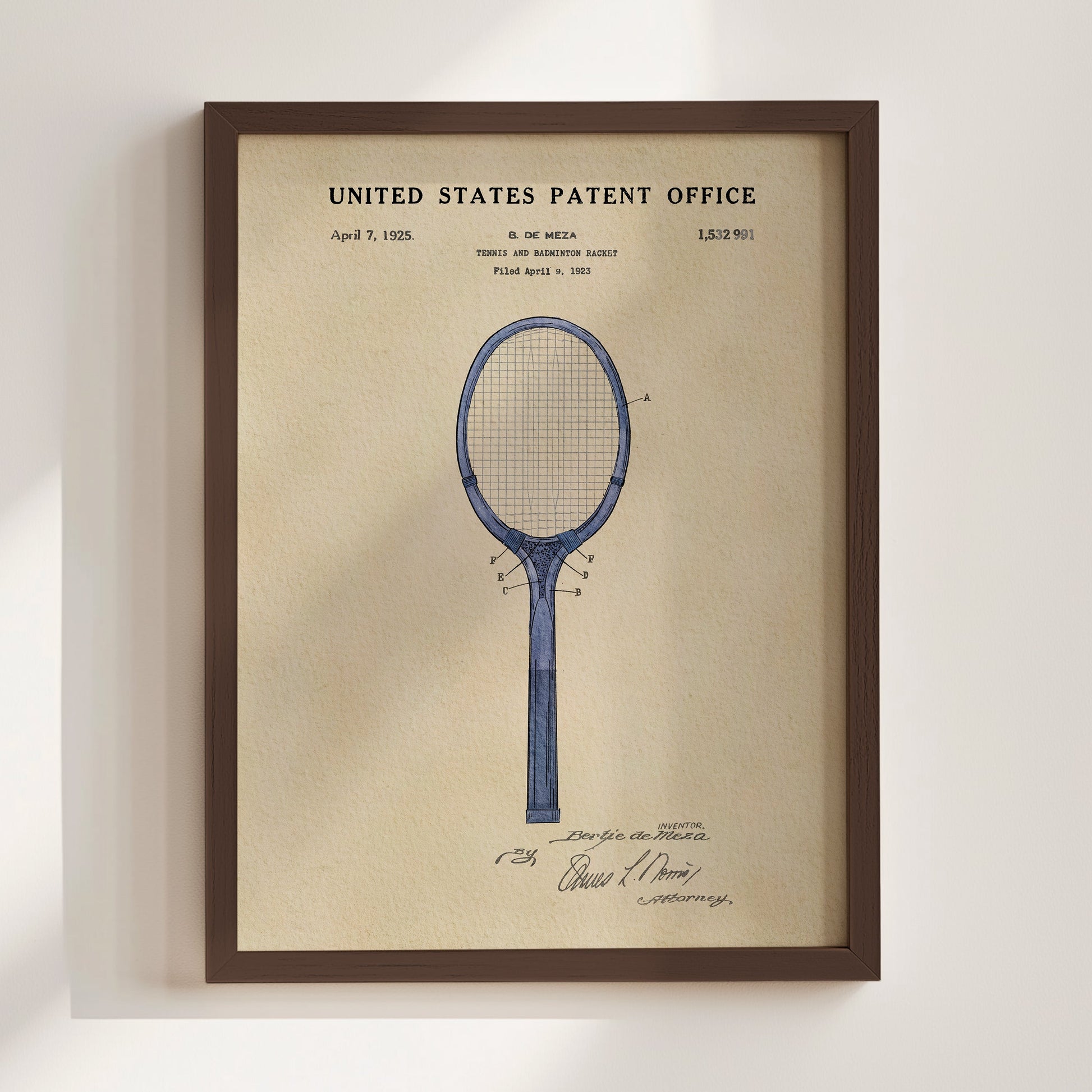 Framed United States Patent Office poster of a tennis racket design on a beige background
