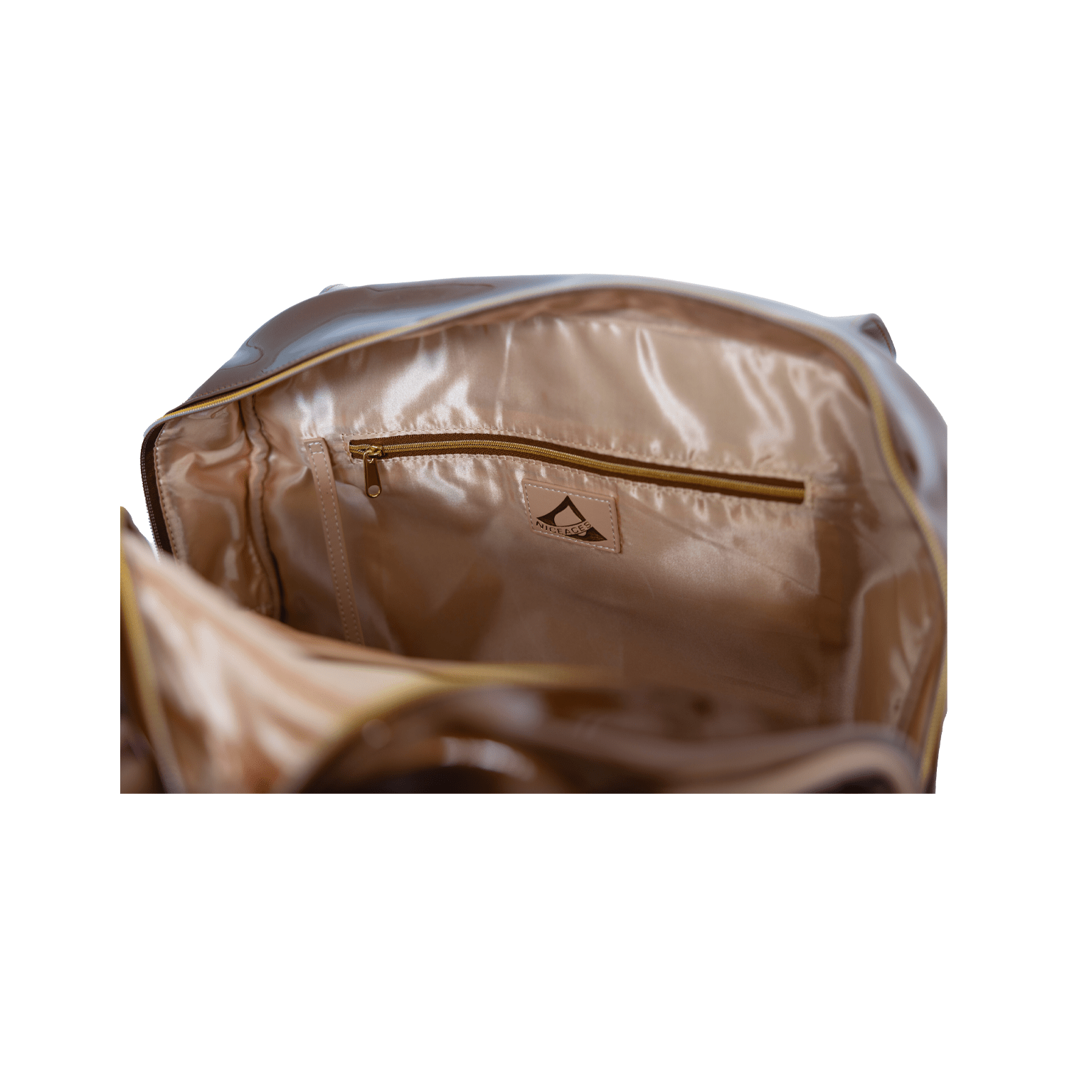 Open beige bag with a gold zipper on a white background