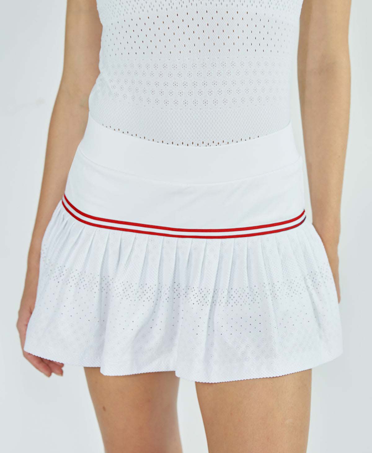 L'Etoile Sport white lace tennis skirt on TennisDujour.com.